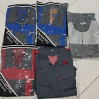 لباسکار|لباس|مشهد, کارگران|دیوار