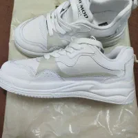 کتونی|کیف، کفش، کمربند|قم, قلعه کامکار|دیوار