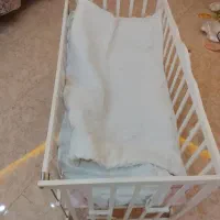 تخت کنار مادر