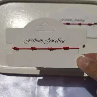 اکسسوری دستبند رِد استرینگ