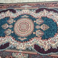 فرش ماشینی سورمه ای گل ریز به همراه موکت