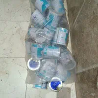 قوطی شیرخشک و ظرف ها و جعبه های شیرینی