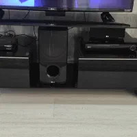 تلویزیون و میز تلویزیون ال جی