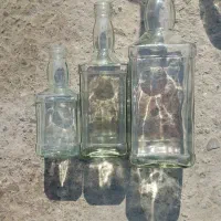 بطری شیشه ای نیم لیتری یک لیتری یکونیم لیتری