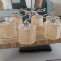 لوستر ۶شعله متحرک استیل براق و شید کرم طلایی