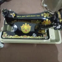 چرخ خیاطی و تلوزیون