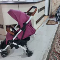 کالسکه نوزاد خارجی تاشو آلومینیومی دسته چرم