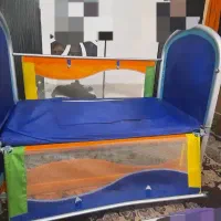 تخت کودک کنار مادر یا گهواره نوزاد