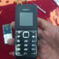 گوشی نوکیا ساده و شارژر