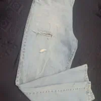 شلوار جین آبی روشن زنانه مدل زاپ‌دار اسپرت