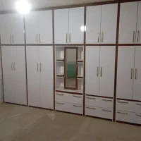 ساخت انواع کمد کابینت ودرب چوبی