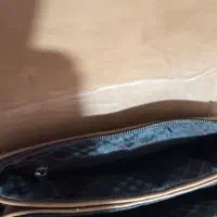 کیف|کیف، کفش، کمربند|مشهد, کوشش|دیوار