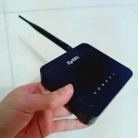 مودم زایکسل به همراه آداپتور و جعبه