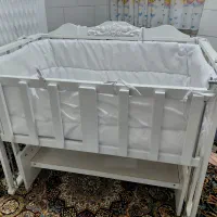 گهواره  نوازاد تخت کنار مادر