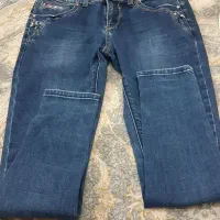 تعدادی لباس در حد نو