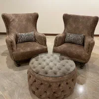 ست مبل دو نفره لمسه‌دوزی به همراه پاف جلو مبلی