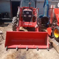 کار با تراکتور بیل دار