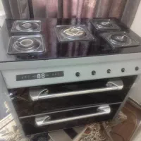 اجاق گاز ۵ شعله طرح فر بیان صفحه شیشه‌ای، سالم