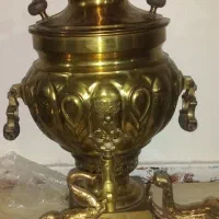 سماور ذغالی برنجی قدیمی دوعدد مجسمه فیل وساعت