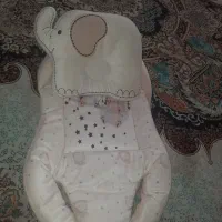 قنداق سویسی|کفش و لباس بچه|اصفهان, باغ فدک|دیوار