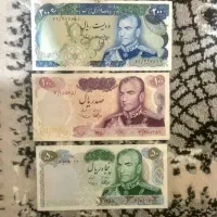 سه برگ اسکناس پهلوی و باکس سکه آبطلا خورده