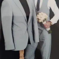 کت شلوار شیک همراه با جلیقه و کراوات و پیراهن سفید