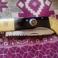 یک چاقوی ضامندار 9 دنده اسپرت و یک چاقوی تک دنده