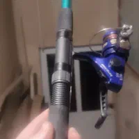 چوب و چرخ ماهیگیری با لوازم کامل