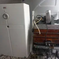 آبگرمکن بوتان ۱۸  درحد نو تمیز  فن دار