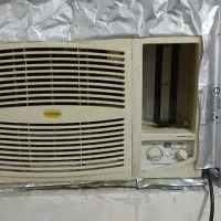 کولرگازی  پنجره ای موتورپیستونی درحال کار کردن|کولر گازی و فن‌کوئل|اندیمشک, |دیوار
