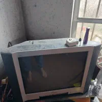 فروش تلویزیون ۲۴ با میز شیشه ای