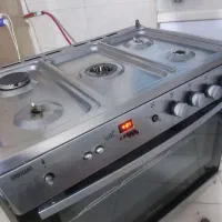 اجاق گاز اسنوا و یخچال فریزر ۶کشو
