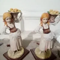 مجسمه دختر باغبون