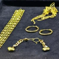 مجموعه ای از طلاهای در حد نو، بدون اجرت