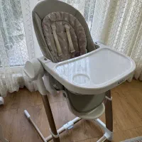 صندلی غذای بچه با حالت تاب شو ،موزیکال ،برند اکسس