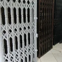 حفاظ آکاردئونی.کرکره برقی کشویی درب ضد سرقت.پنجره