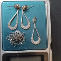 گردنبند و گوشواره نقره|جواهرات|بومهن, |دیوار