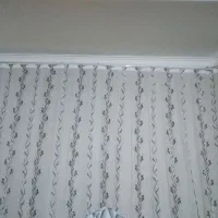 پرده 15متری که دوخته شده اش 5متره