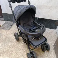 کالسکه وکریر درصورت خرید لباس کودک هدیه داده میشود