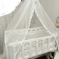 گهواره تخت کنار مادر