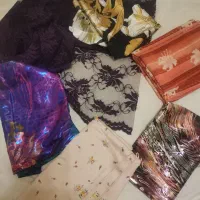 لباس مردانه وزنانه نو پارچه ای