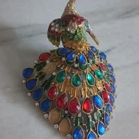طلاووس برنز