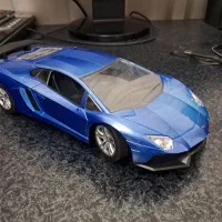 ماشین لامبورگینی با فرمون و پدال گاز و ترمز و شارژ
