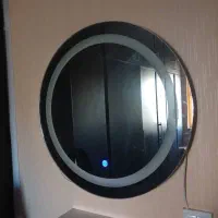 اینه گرد چراغ دورش روشن میشه