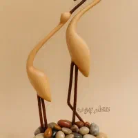 مجسمه چوبی لک لک