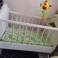 تخت گهوارهای کودک با تشک نونو.تخت بچگانه|اسباب و اثاث بچه|پرند, فاز ۳|دیوار