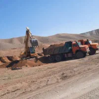 بیل مکانیکی لودر و کامیون