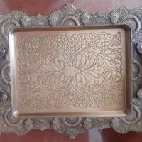سینی به همراه استکان پایه دار نقره ای و سینی استیل