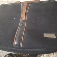 کیف لباس ( ساک ) به همراه مدارک بنام صفوره الچنت