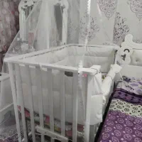 کنار تختی نوزاد